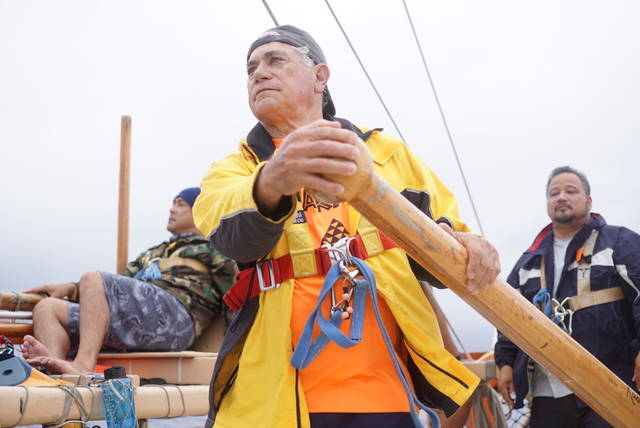 Kaniela Anakalea-Buckley steers Hokule‘a during a voyage from Miloli‘i to Kawaihae Sunday. (Cameron Miculka/West Hawaii Today)